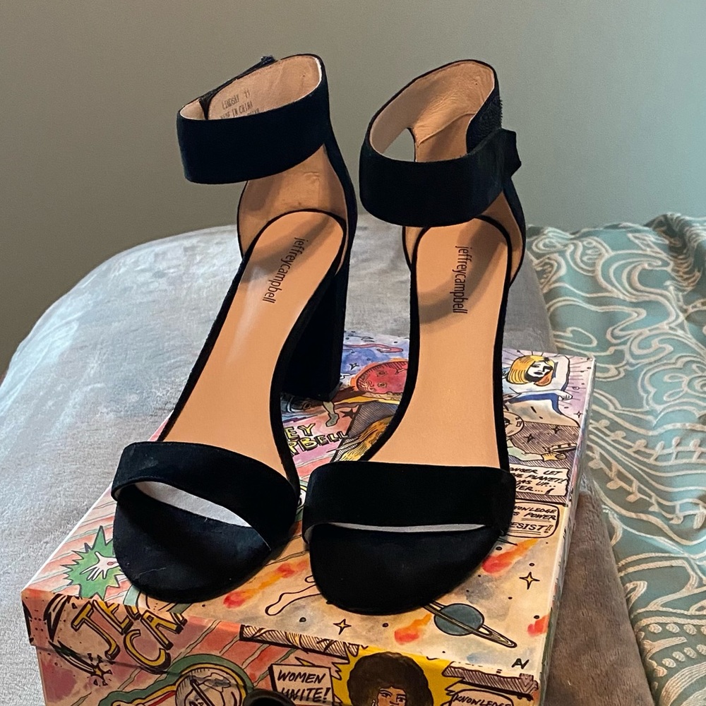 Black suede high heel sandals with Velcro ankle strap.